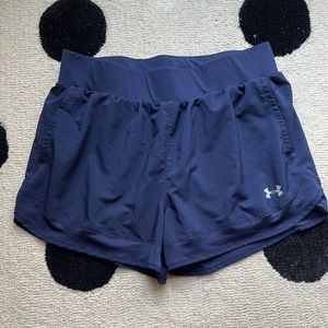 Women’s Under Armour running shorts. Navy blue with silver UA decal.